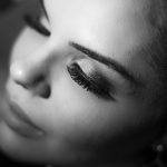 Long lashes on face of young woman